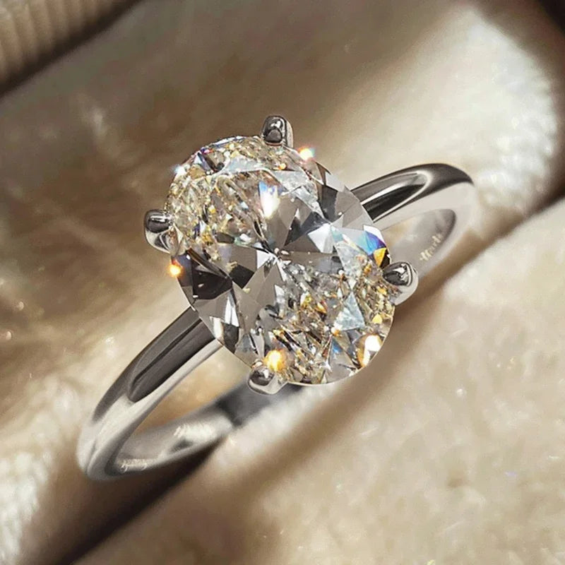 Elegant Georgina oval ring photographed with soft lighting, showing the oval ring charm and sophistication — Opal Whispers.