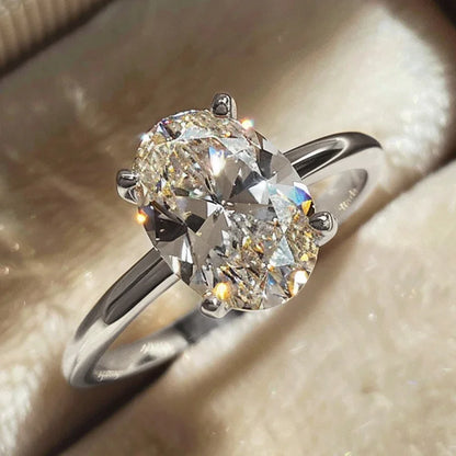 Elegant Georgina oval ring photographed with soft lighting, showing the oval ring charm and sophistication — Opal Whispers.